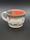 Mug Poppy throw rings colored pipes